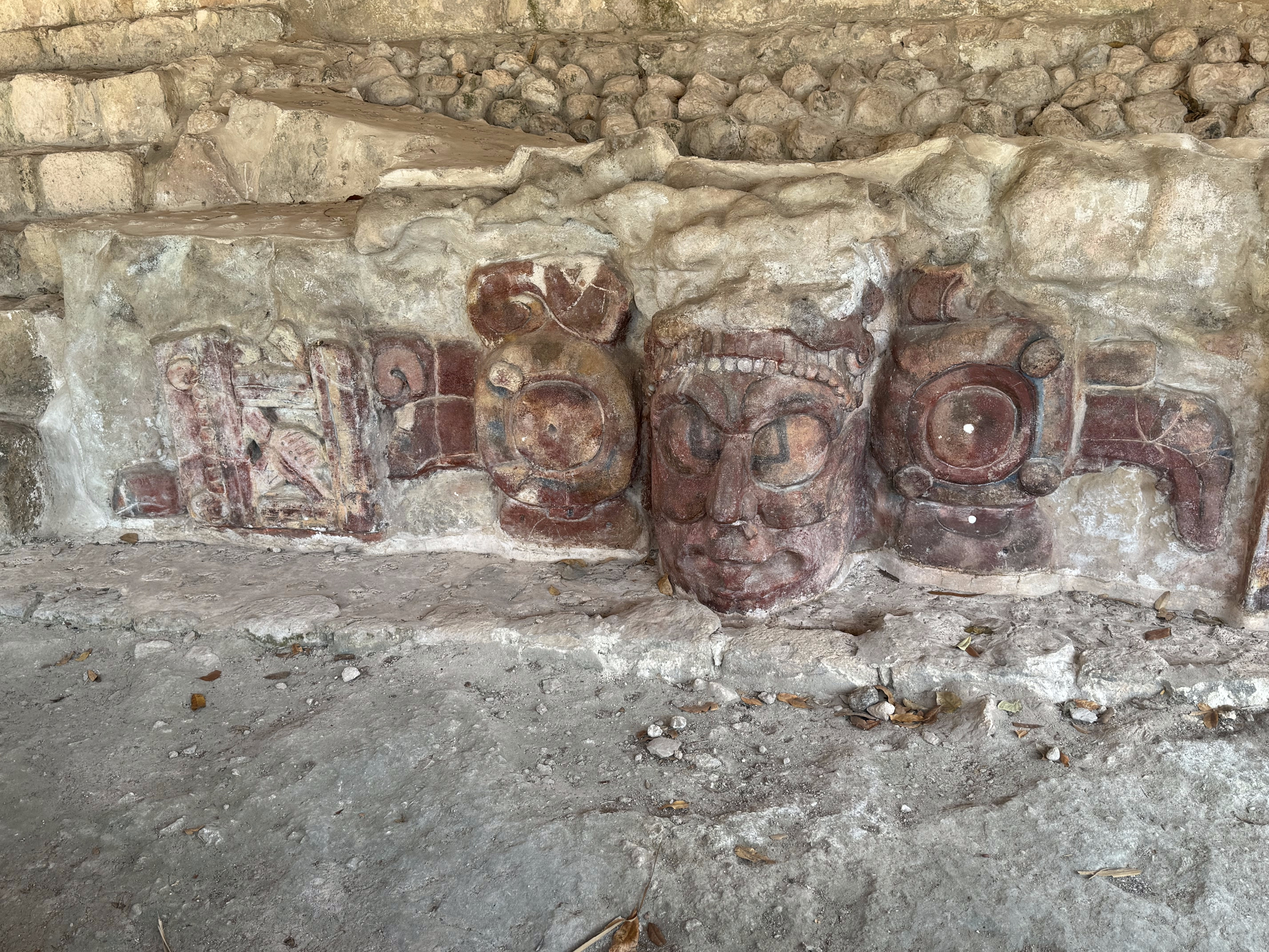 Images of K'inich Ahau, the sun god, flank a stairway.