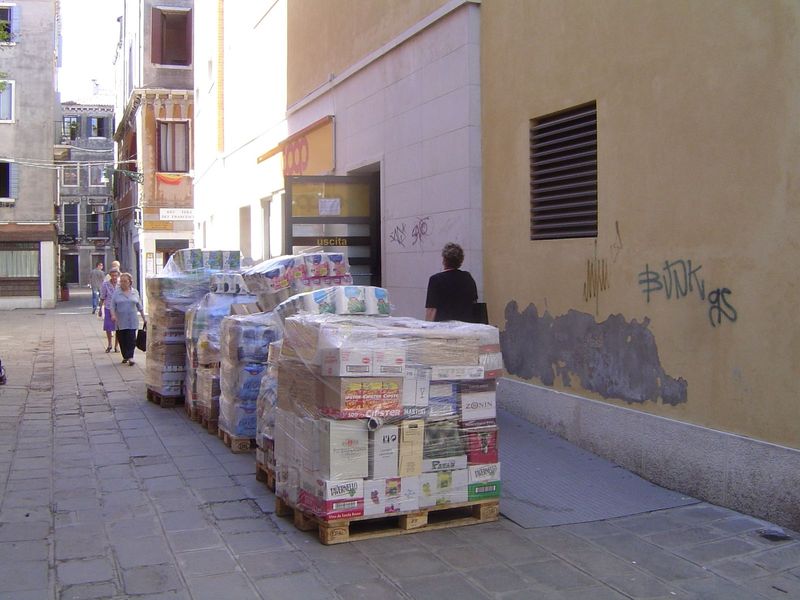 Pallets delivered by boat for the adjoining supermarket.