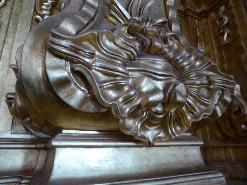Gilt wood.