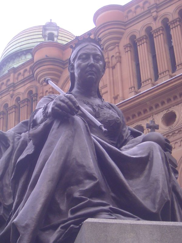 Next to the building in another of those "she's not amused" statues of Victoria. She arrived here in 1987 and perched in what had been a tra