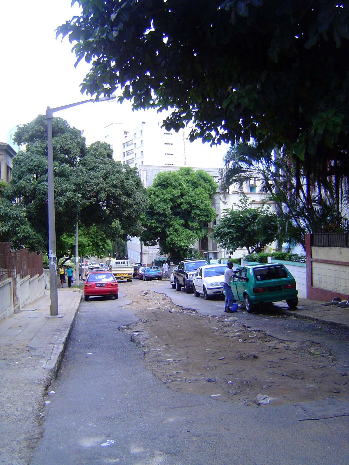 A tattered street on the slope between the terrace and waterside.