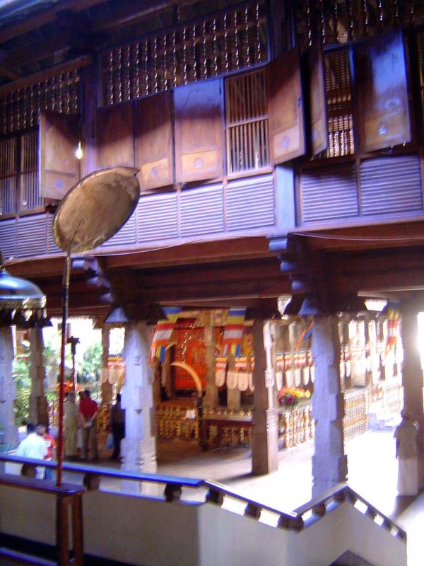 The stone columns are characteristically carved to look as though they are chamfered timbers. Up close, the ornamentation on each column is 