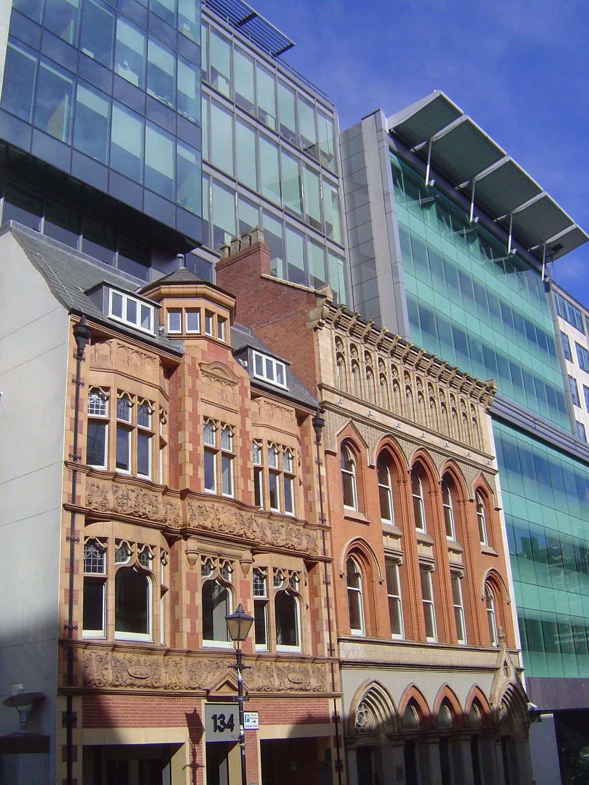 Couldn't ask for a better example of facadism. Here we are at 134 and 136 Edmund Street, the one Arts and Crafts, the other Gothic, the firs