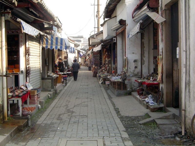 The shop-lined approach to Wang Shi Yuan, the Garden of the Master of Fishing Nets.