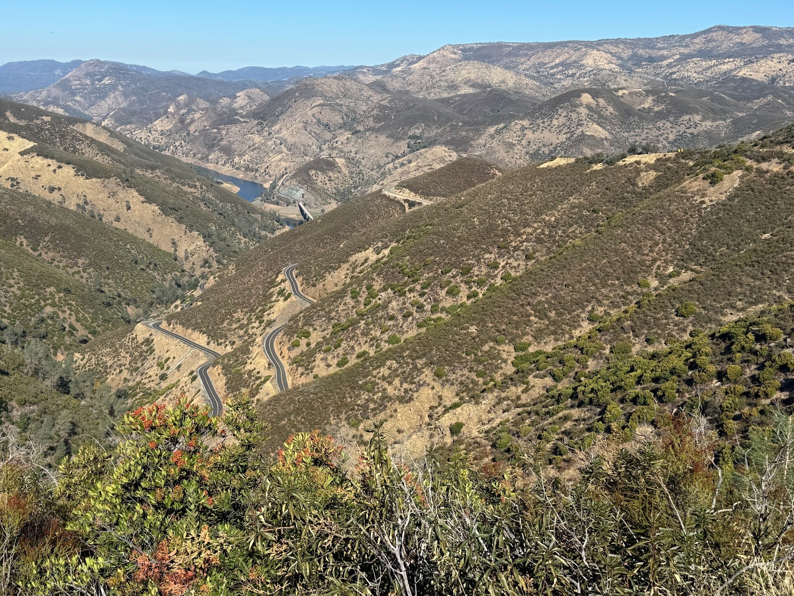 We're back on 49 a few miles north of Bear Valley and overlooking Hell Hollow, with a view down to Lake McClure, a reservoir on the Merced R