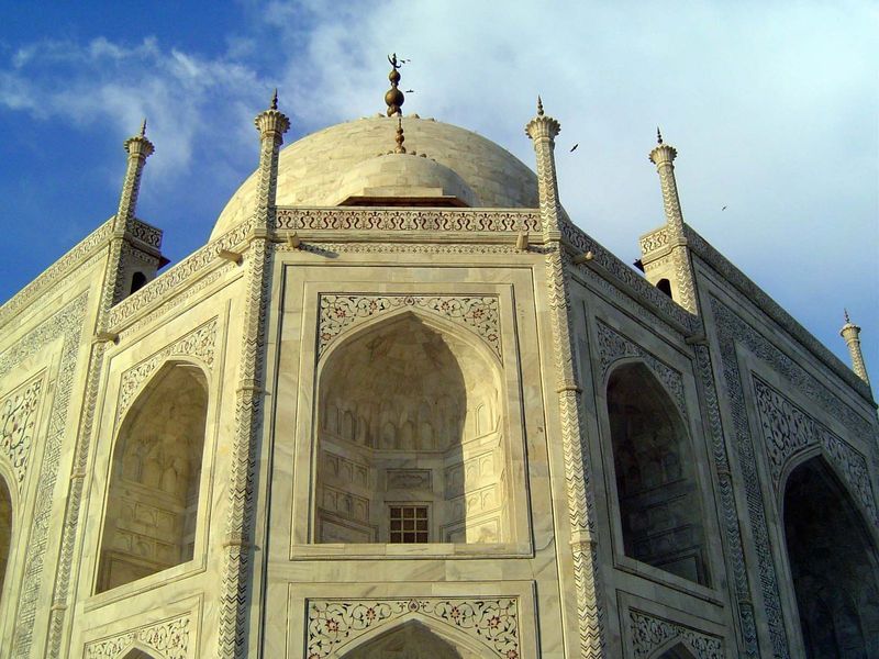 The design is square, with the corners chamfered or cut away.