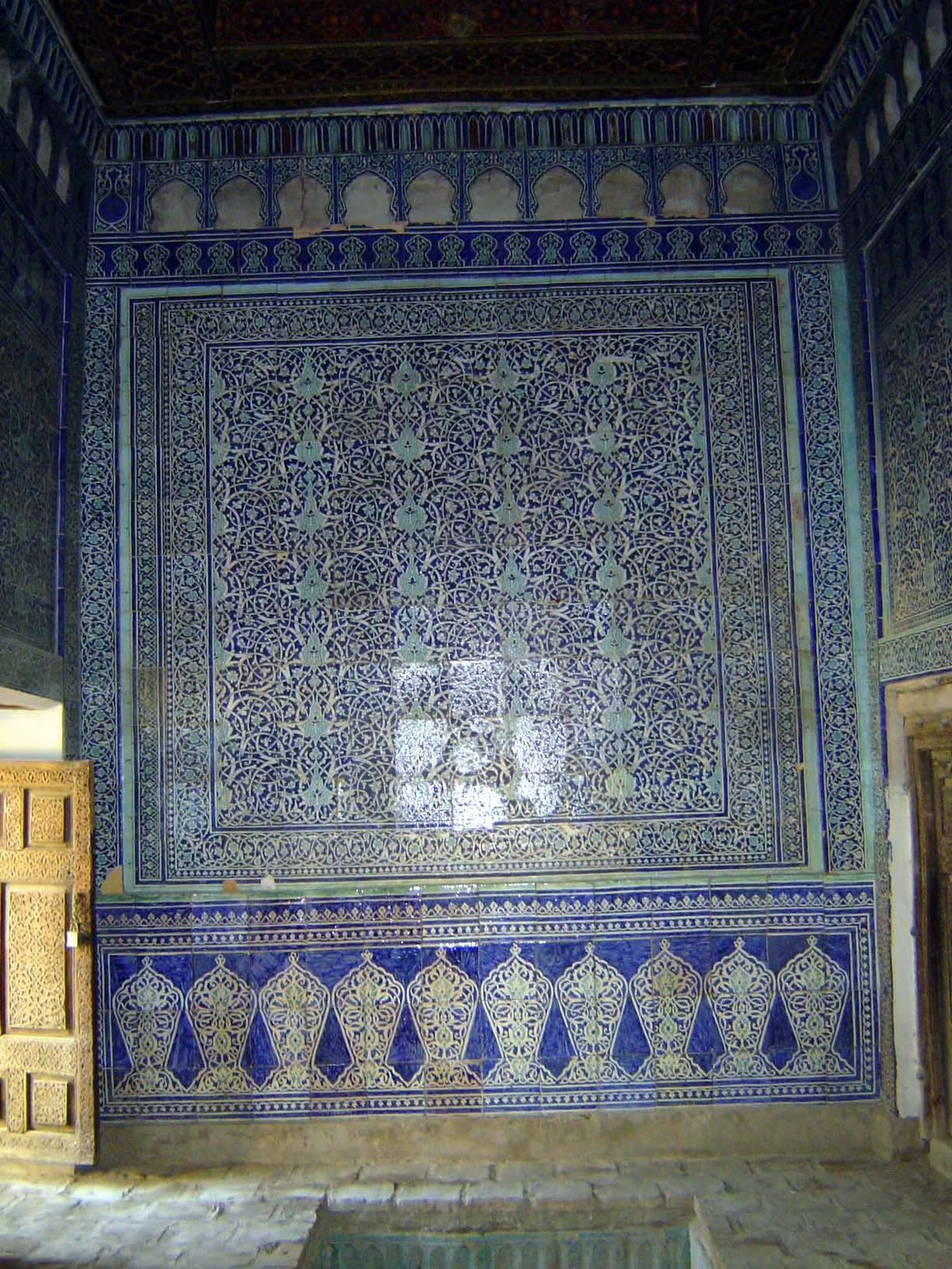 Another open door leads into a room decorated wherever possible.