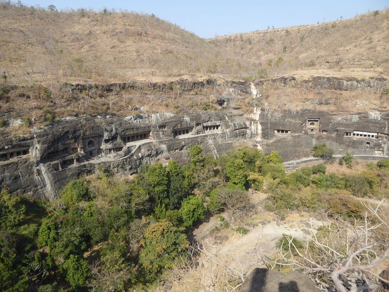 From the viewpoint at the end of the ridge, there's a good view from Cave 28 on the left to 17, where a recently added white screen offers s