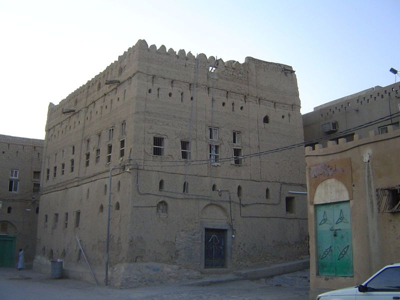 A building of many windows, some old-style and others new.