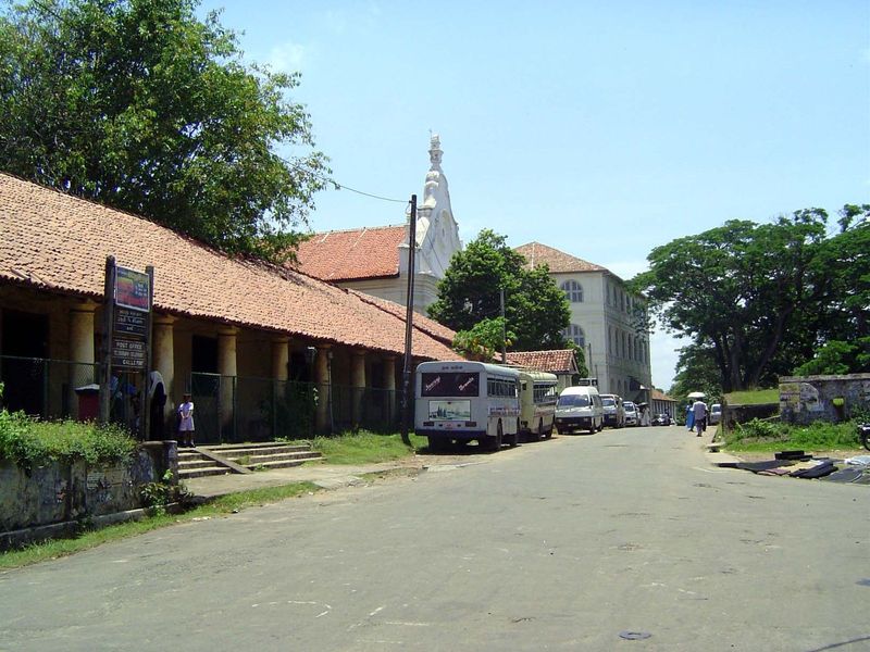 The hotel is in the background. On this side of it is the Dutch Reformed Church, of which more later. The building in the foreground contain