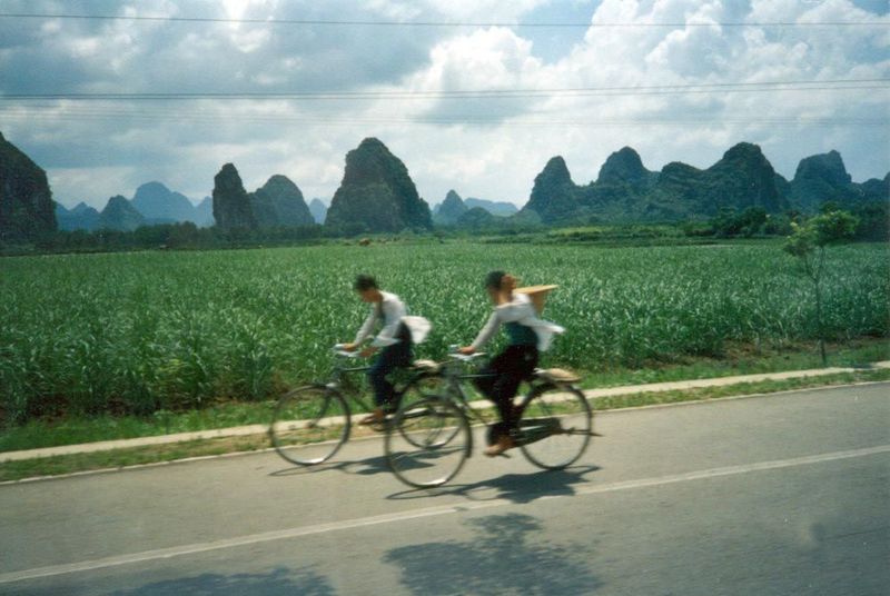 Rustic imagery sells airline tickets and women's clothing, but the people of Guilin are pushing for change. Are those power lines? Is that a