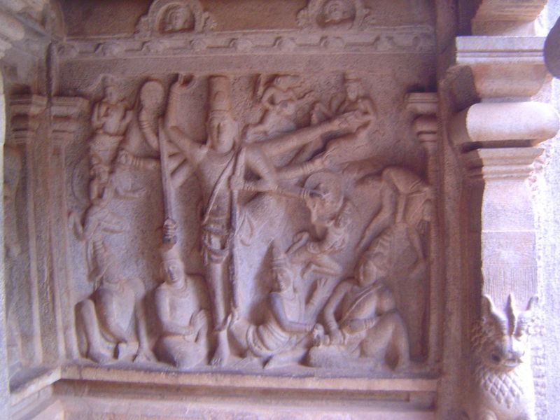 Facing the Varaha panel is one showing Vishnu as Trivikrama. The story is that he had tricked King Bali into giving him as much land as he c