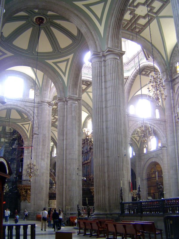 The interior is vast and airy, Gothic in its height and airiness, though neoclassical in its arches and perhaps merely unfortunate in its fl