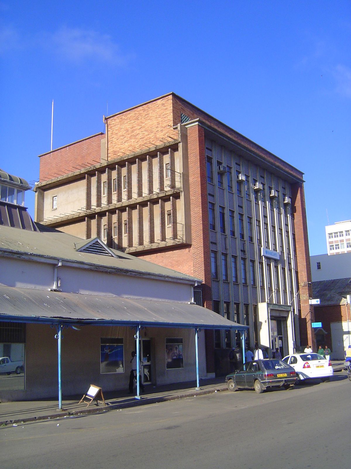 The city has a surprising number of buildings from the 1950s through the 70s. This one is noteworthy only because of its neighbor. The new b