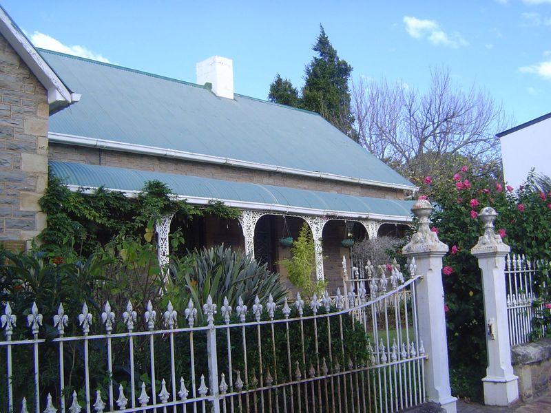 By the time of the university's founding, Grahamstown had plenty of nice houses. Here's one, probably with imported cast-iron fencing.