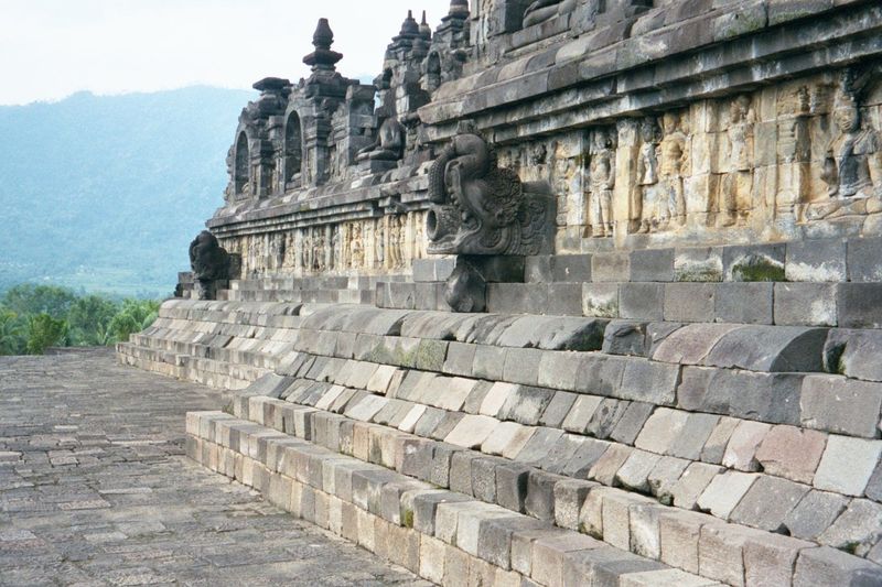 Looking south from the base of the east side: sculpture fringes the outer balustrade of the first platform.