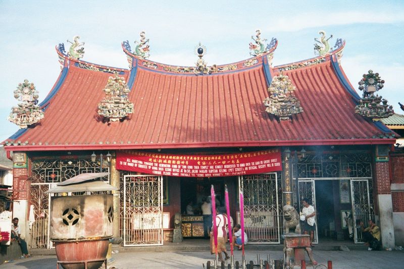 There's plenty of community to lose. Here's a fragment of it: the Kwan Yin Temple, a busy place.