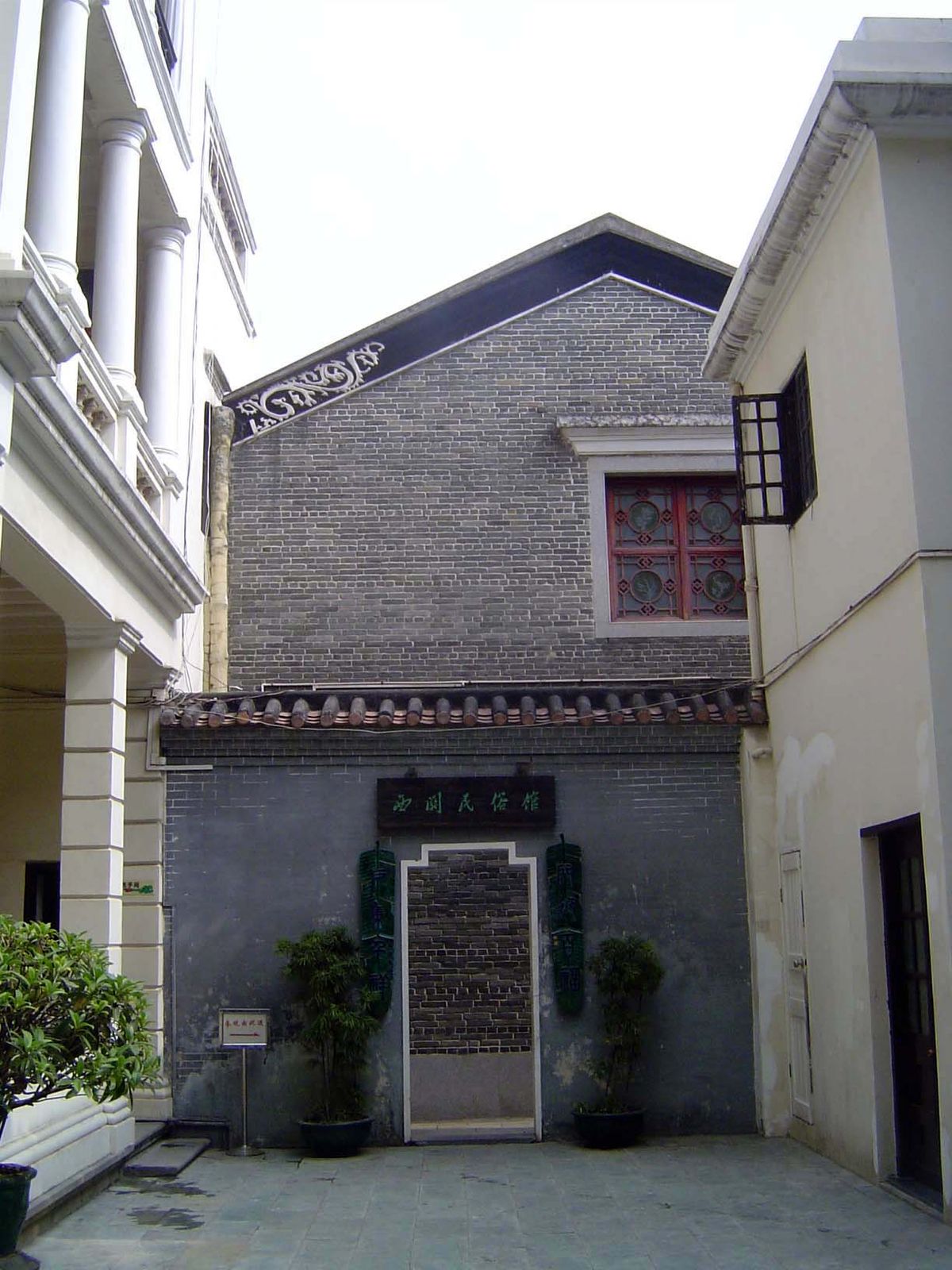 Fused onto that European house is the real one. The style is called Xiguan, although this only means West Guang, as in "a house in the style