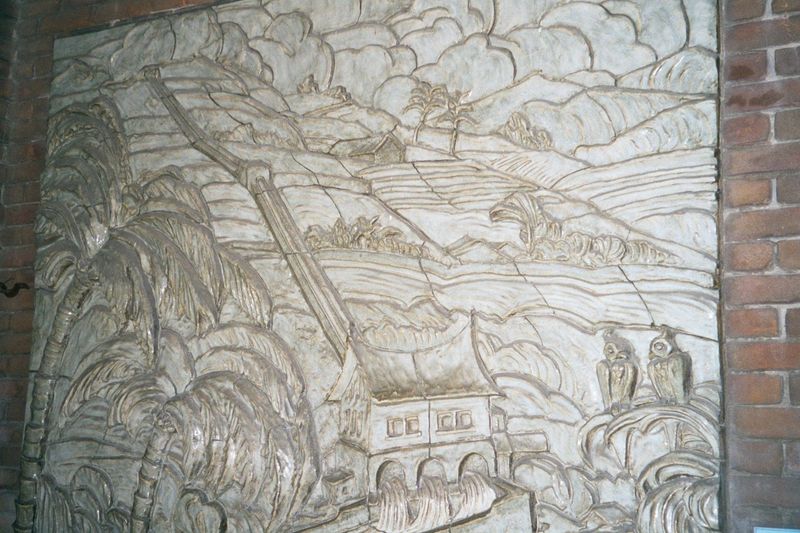 Here's a duplicate of a panel made for ANIEM, the Dutch-controlled electricity company in Jakarta. Penstocks run down a hillside into an Ori