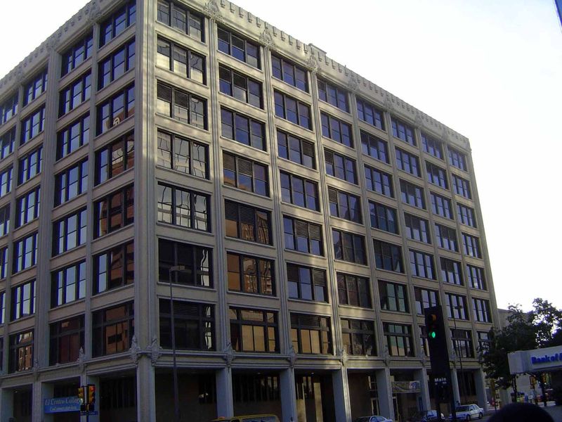 Stripped down a bit—it's lost its cornice—this was downtown's first big department store. It was Sanger's, built in 1900 by the brothers who