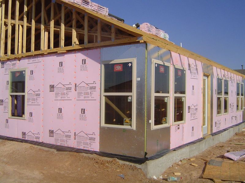 Foam walls with OSB sheeting at the corners, for greater strength. Norman is said to have some of the best construction in the state, mainly