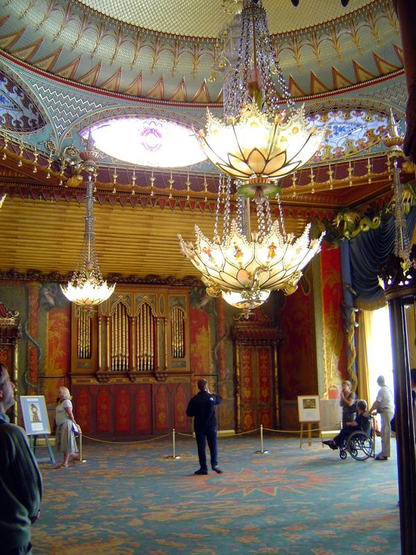 The opulent Music Room was originally decorated by Robert Jones and Frederick Crace but rebuilt after a fire in 1975. Lieven writes, "I do n