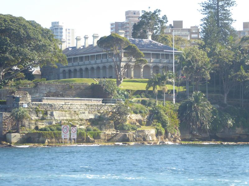 Less than a mile though world's away from the controversy, Admiralty House looks south across the harbor. It's the official Sydney residence