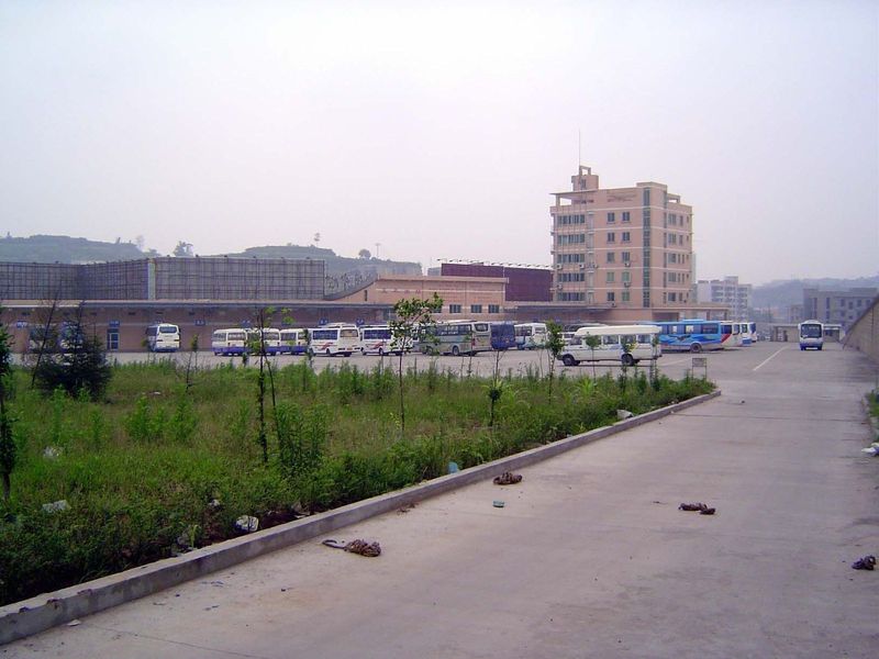 The city bus terminal, with buses from local villages like Shu-Guang.