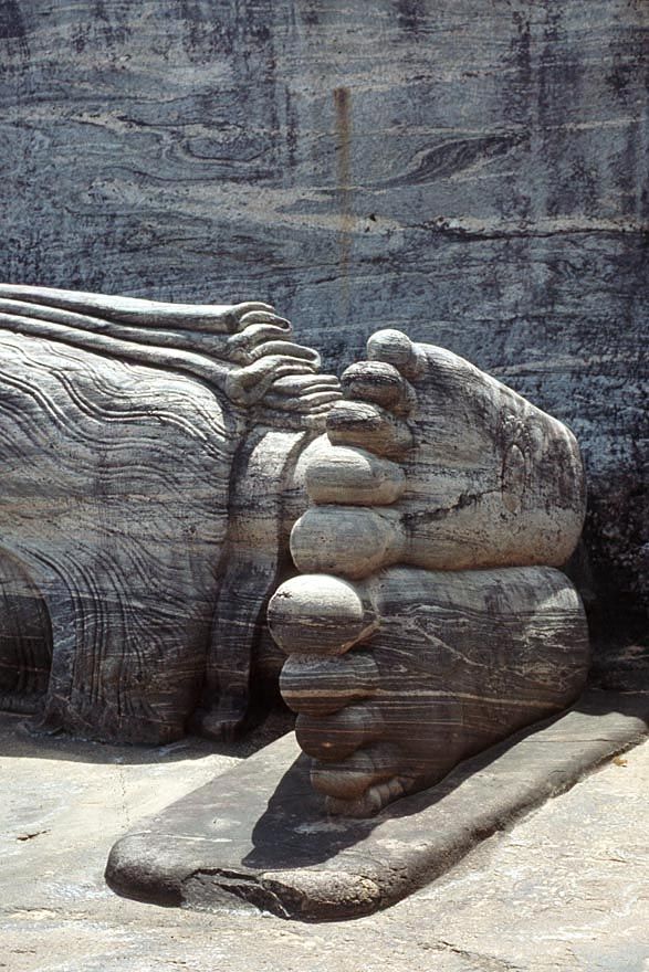 Everything about the figure is composed, stylized, yet relaxed.