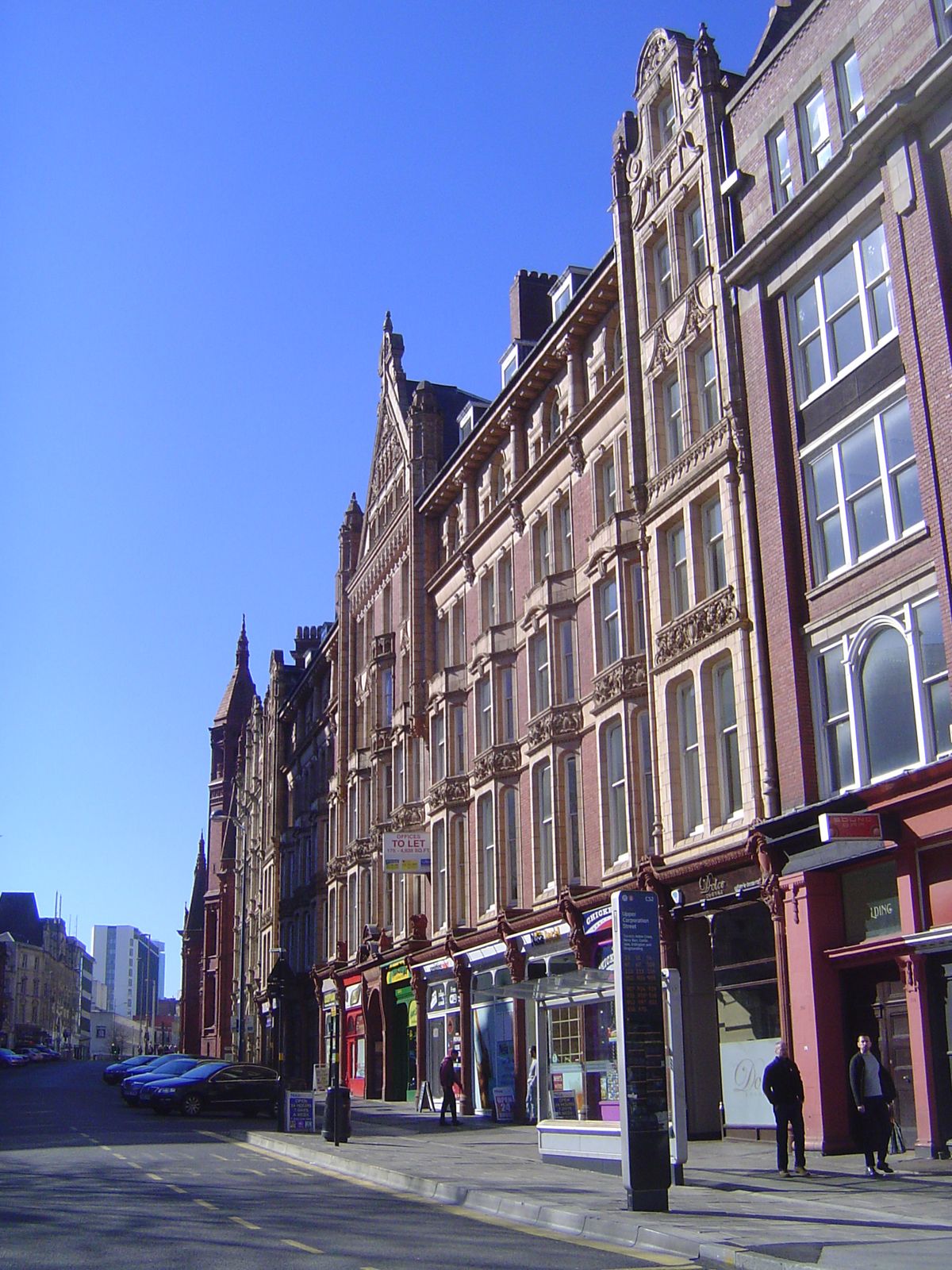 A later generation went red. Here, close to the Victoria Law Courts and Central Hall, is the Ruskin Building, faced with terracotta.