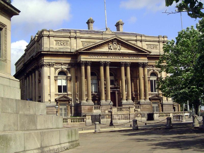 Flanking the library, the County Sessions courthouse.