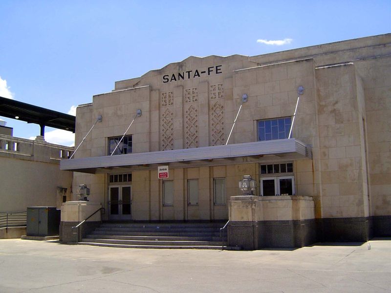 The train platforms are elevated on the left.