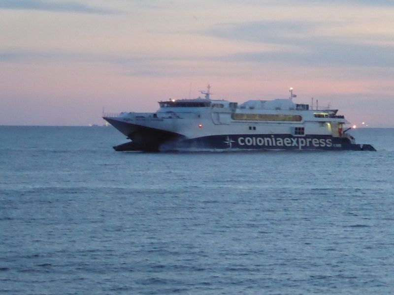 A ferry from Buenos Aires arrives at dusk; it's a 50-minute trip.