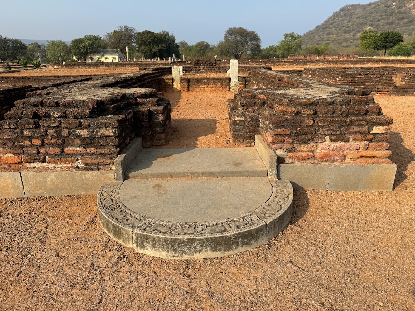 And here, in front of another prayer hall, is a moonstone closer to what moonstones can be.