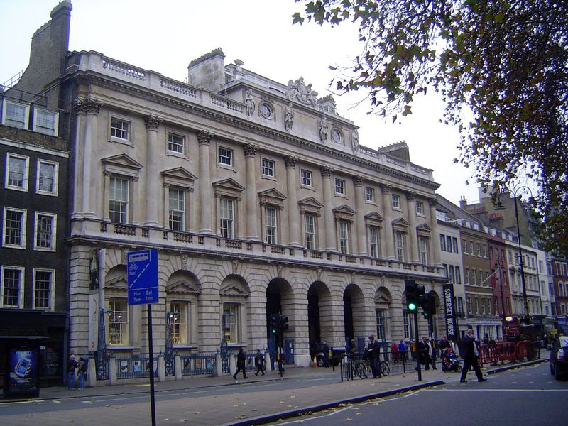 Where did the British government do its business? An early surviving example is Somerset House, designed by William Chambers and built to ho