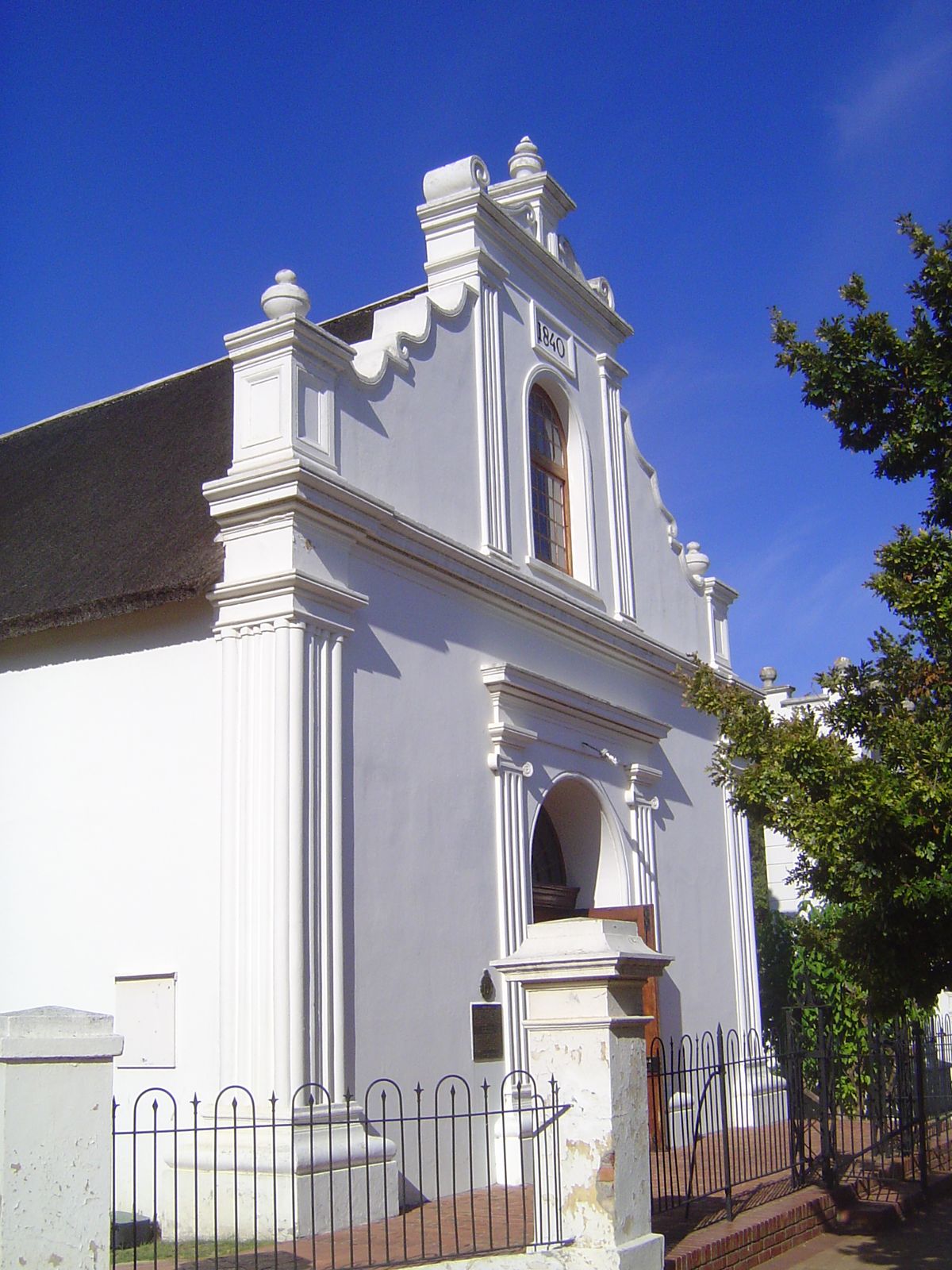 The second wing. Wouldn't you know it: a service was in progress, but an hour later, service over, the door was locked tighter than... metap