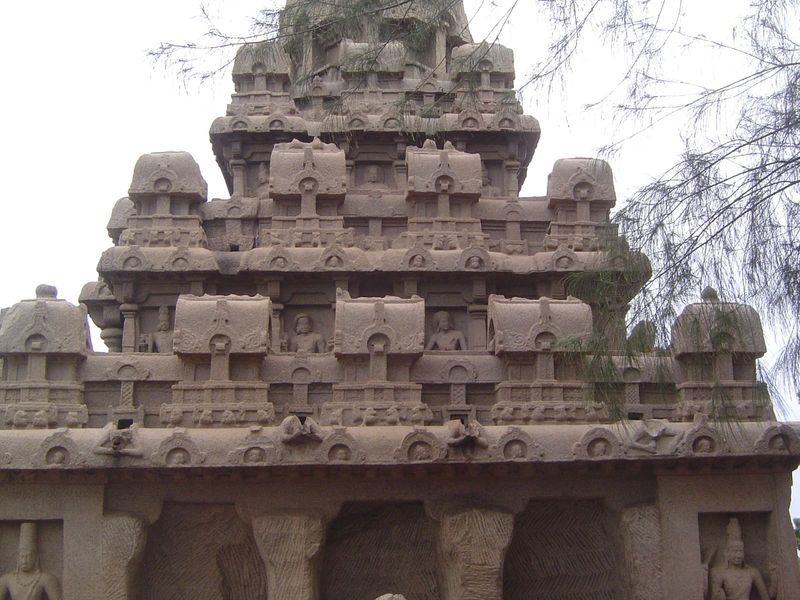 Figures peer from every level, although those on the lowest level have been decapitated.