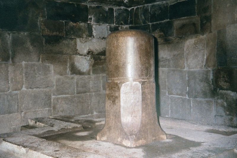 Inside, a burnished lingam rises from the encircling yoni.