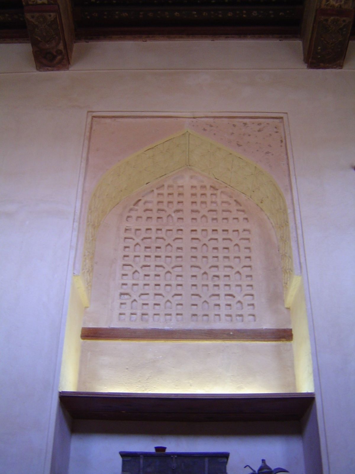 Wall above a fireplace.
