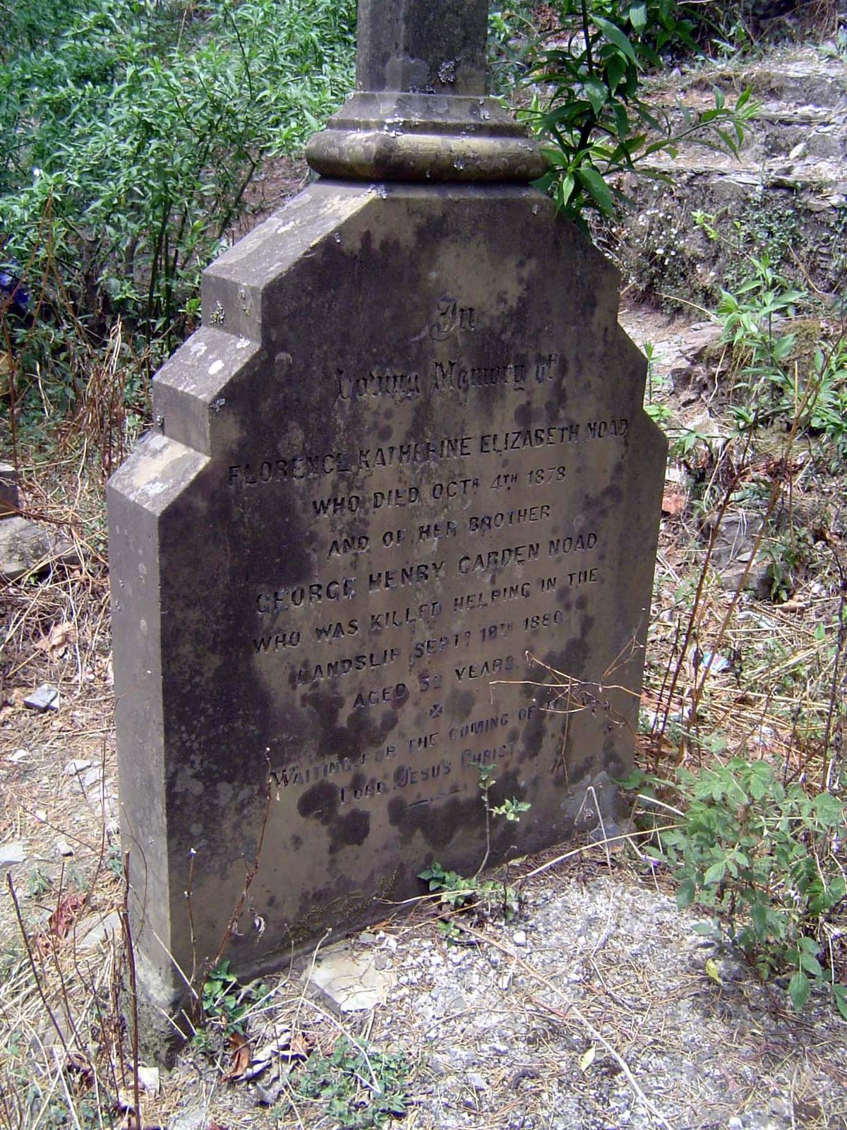 A tombstone noting the death of one of the hundreds killed in a huge landslide at the west end of the lake in 1880.