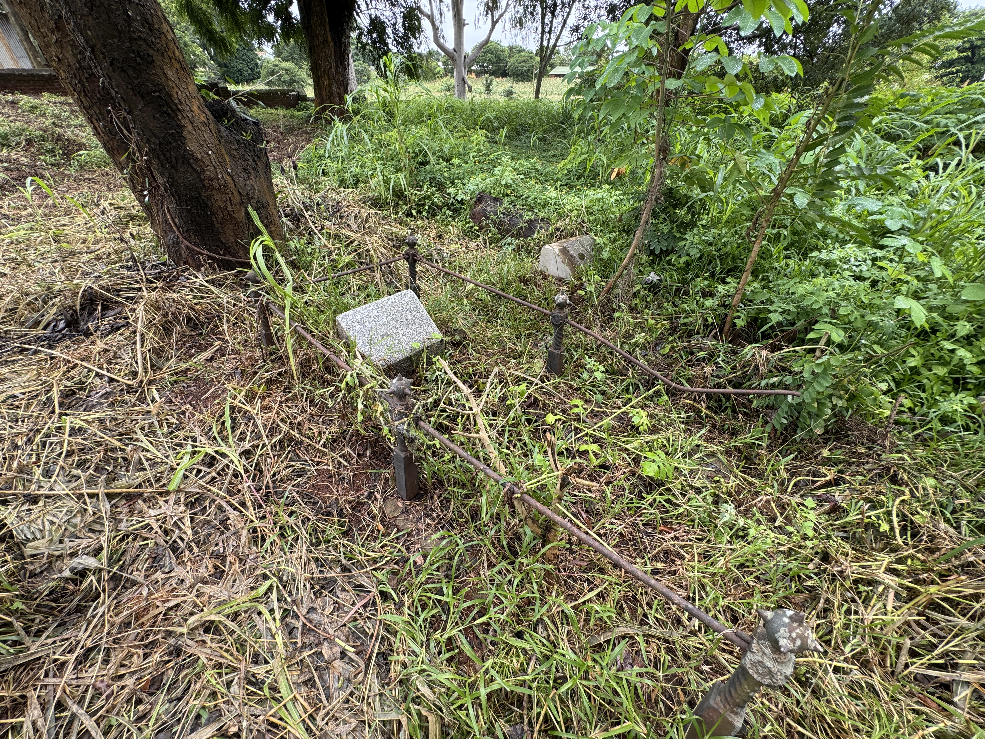 An illegible stone marks the grave of Joseph Watson, 1869-1903.