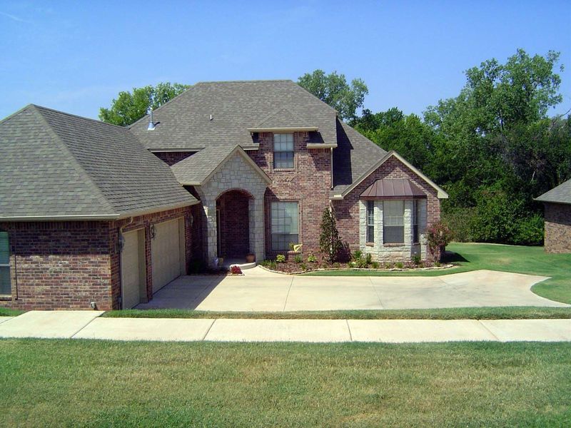 A house fronting on raw land.