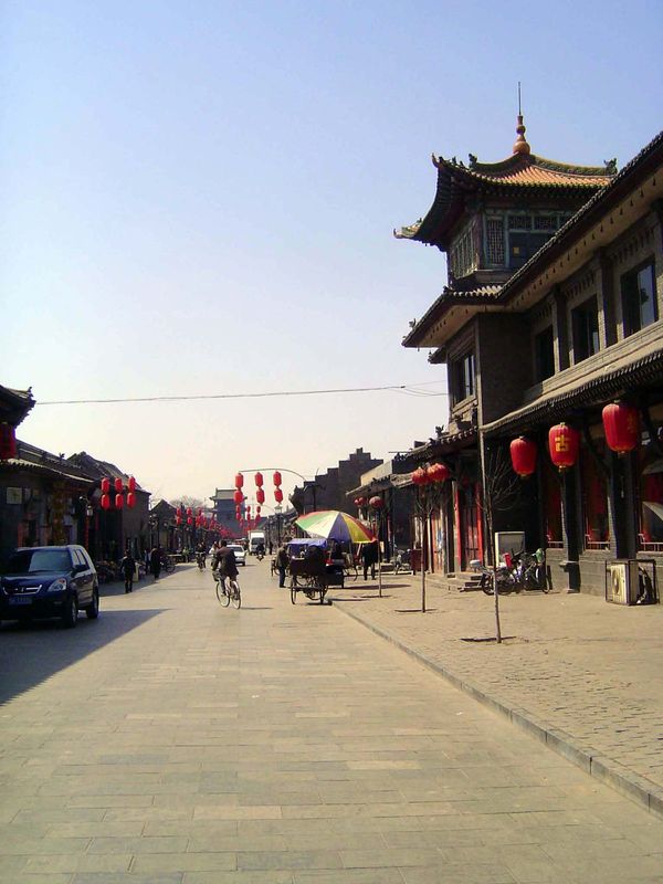 We'll venture inside the west or Fengyi Gate. Predictably, the streets are gridded. This is the primary east-west street, which runs from ga