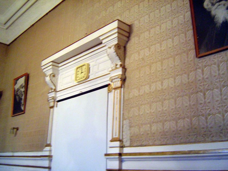 Buck writes p. 52, "The Council chamber of twenty years ago was a handsome room with teak panelling hung with silk, and adorned with a compl