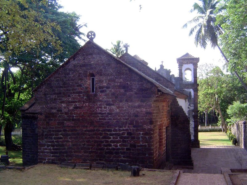 Rear of the church, showing the characteristic laterite blocks.