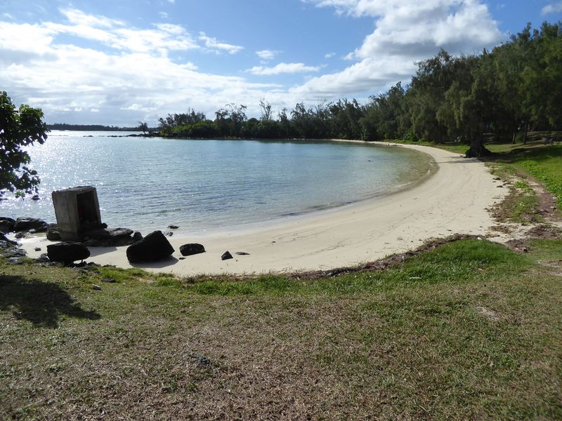 Persist and you can find quiet beaches up here, too. The block on the left houses a tiny Hindu shrine.