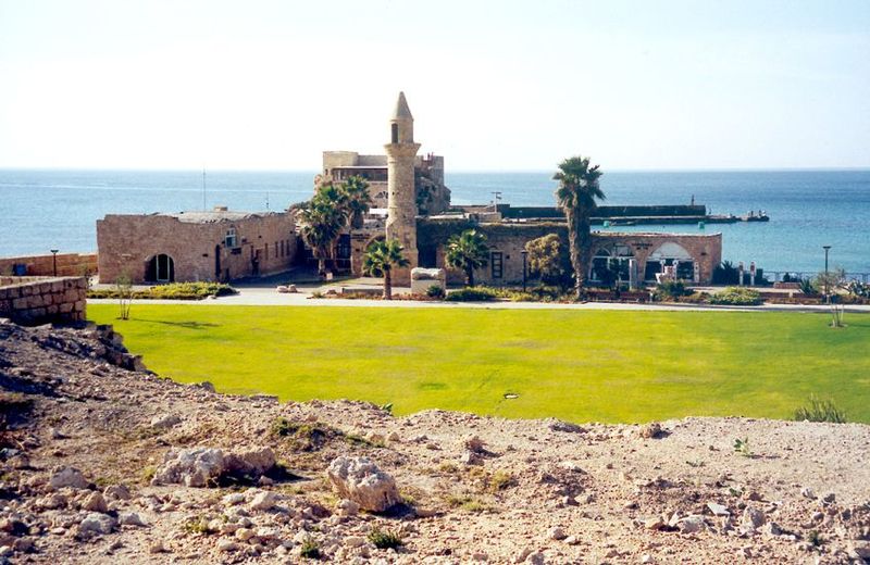 The lawn occupies Herod's inner harbor, where ships docked at the foot of a platform supporting a Temple of Augustus, from whose site this p