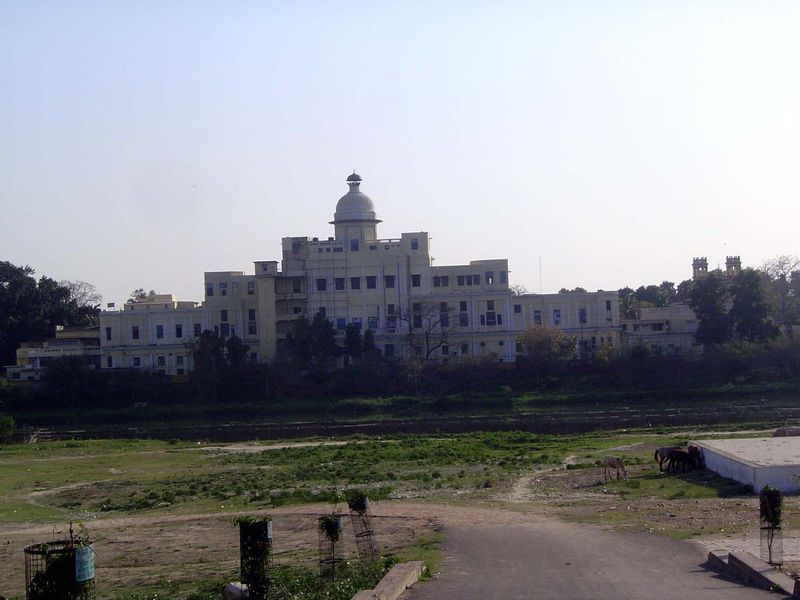So much for imambaras. Here is the Bara Chattar Manzil, the "great parasol palace" seen from across the River Gomti. It was begun in 1803 by