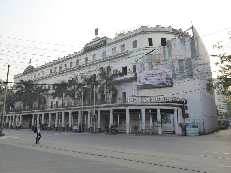 A block east, and due south of the eastern side of BBD Bagh, the sign Lalit Great Eastern replaced a much larger sign than once read Great E