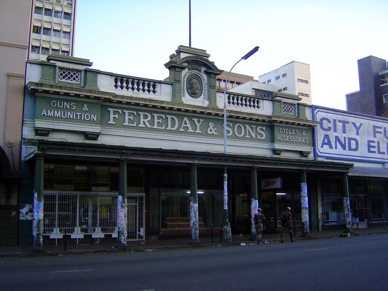 Fereday was a gunsmith who opened this shop in 1910. Now it sells clothing but hasn't bothered to paint over the old sign.